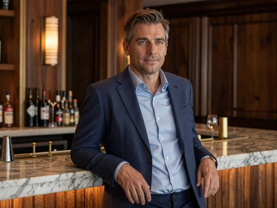 Professional man at an upscale cocktail lounge representing attorneys and finance leaders seeking local dating